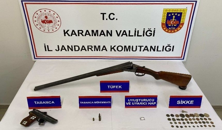 Karaman’da tarihi eser ve ruhsatsız silah ele geçirildi